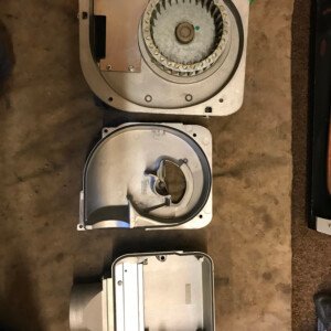 Riello oil burner fan assembly stripped to check and clean on service.